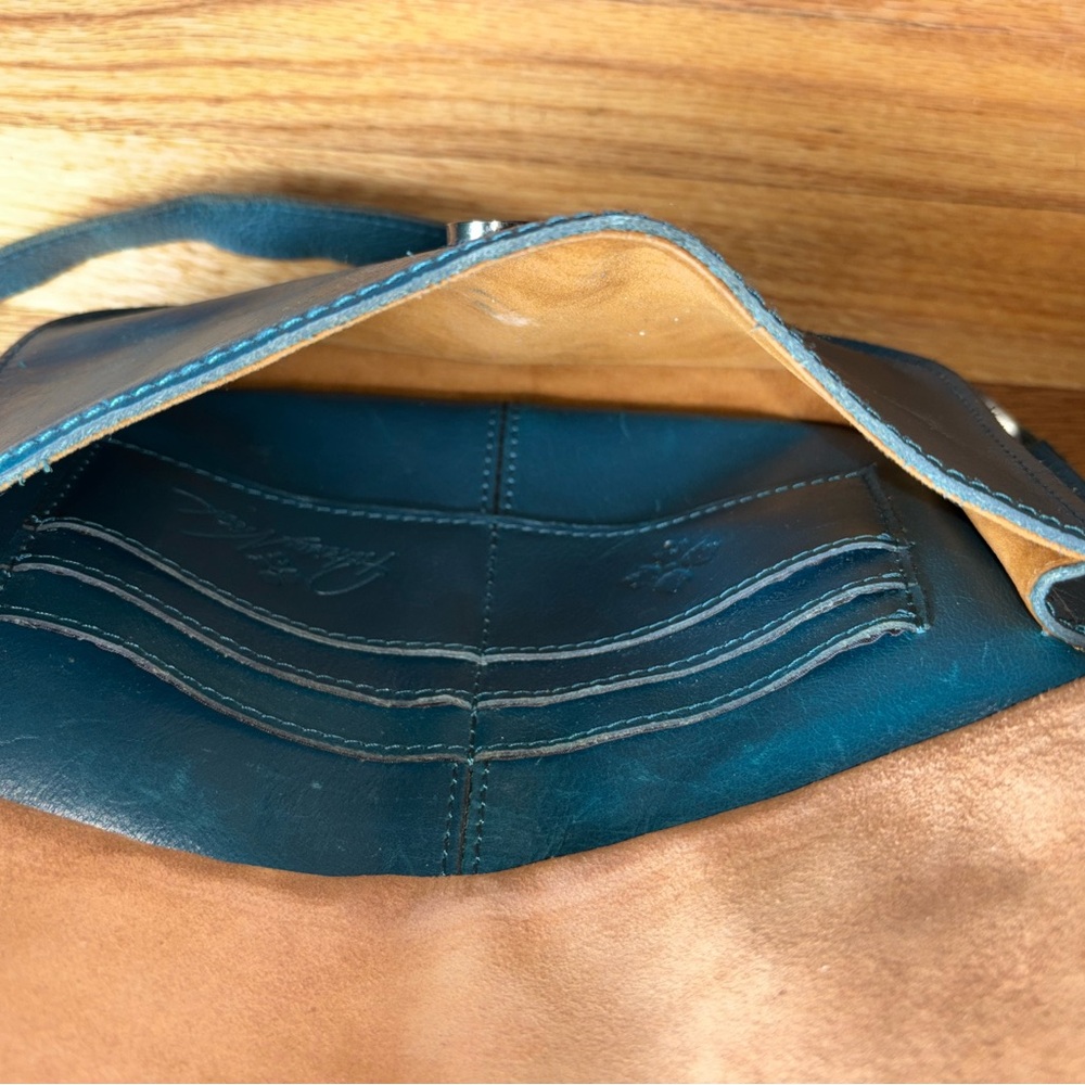 Patricia Nash Blue Shoulder Bag with Embossed Design and Tassel - Picture 10 of 12